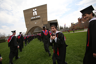 Photo of Johnnies lined up outside of the Abbey on their graduation day