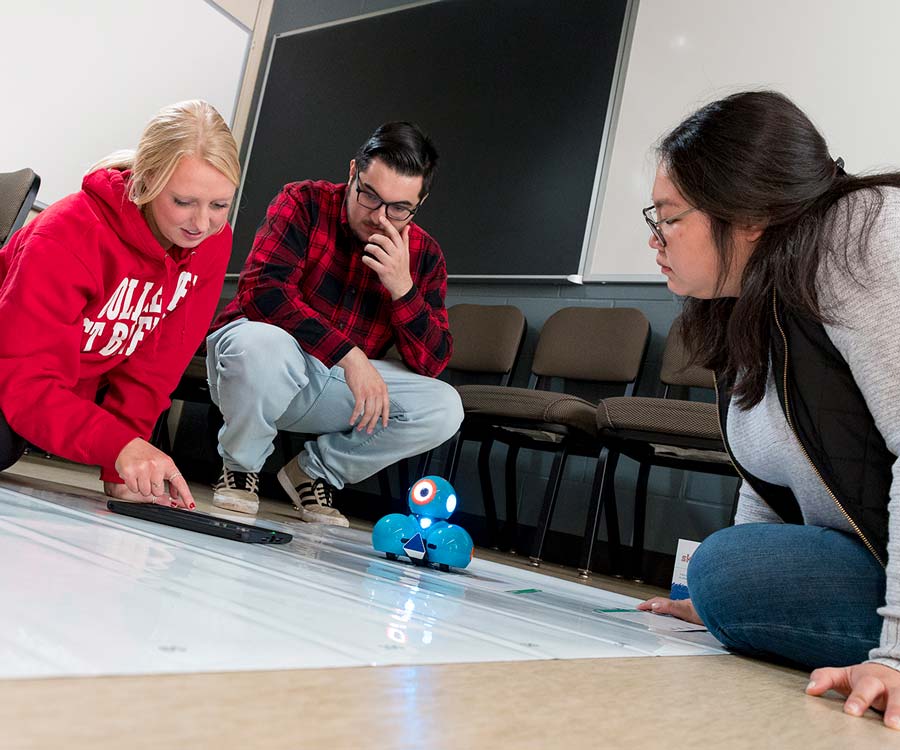 Saint Ben's and Saint John's students conducting field tests for class project