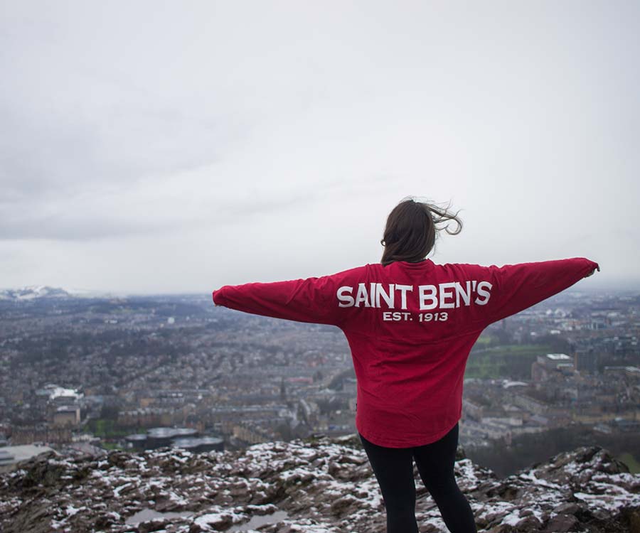 C S B student posing on scenic overlook.