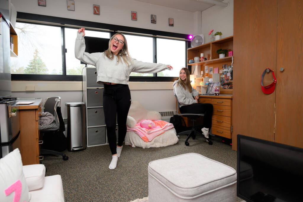 Students happy in dorm room