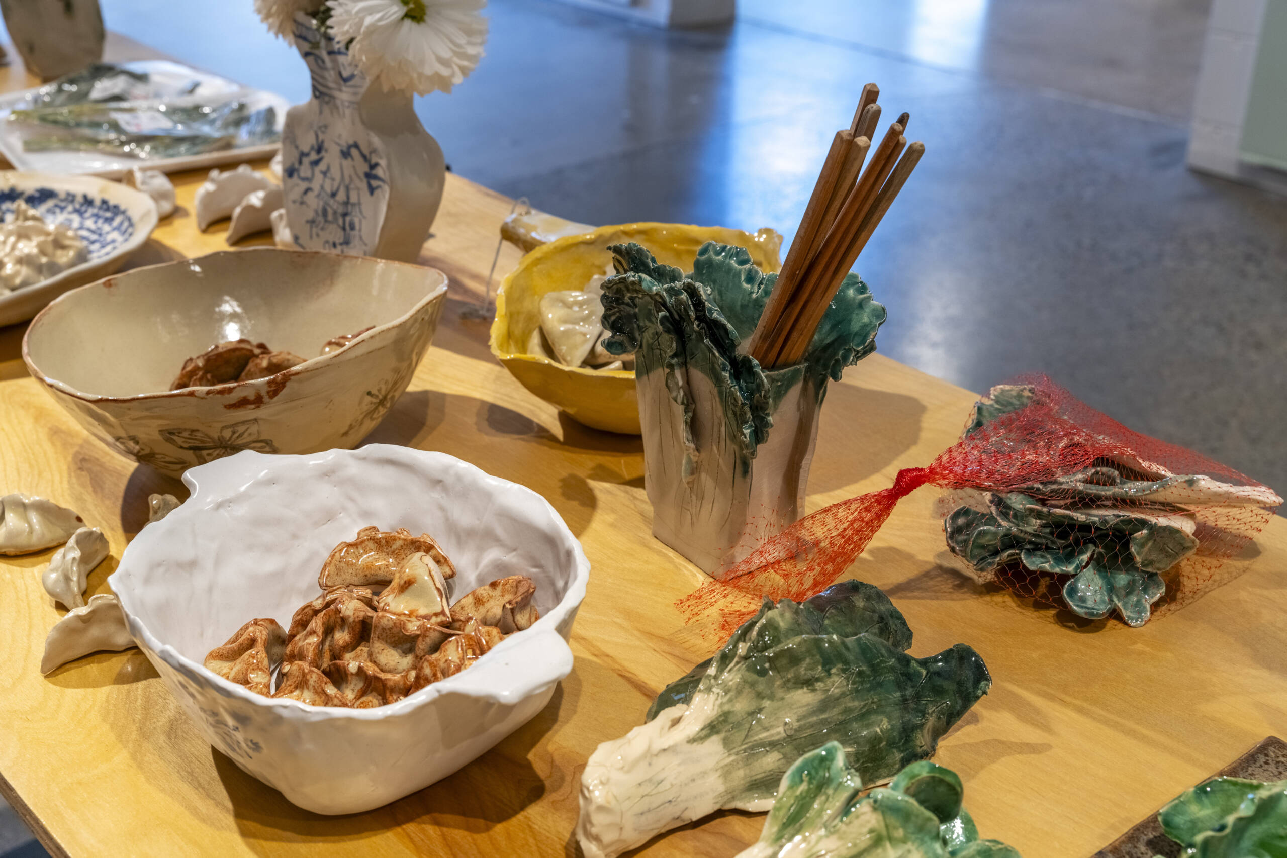 table with food and chopsticks.