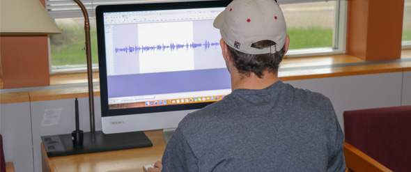 A SJU student editing an Audio Project 