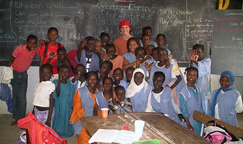 Cody Fischer with the students he taught English to in Senegal