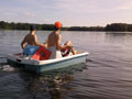 Two people paddle boating