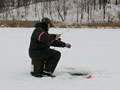 A man ice fishing