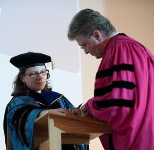 Image of Past President Michael Hemesath being inducted as an Alumni Member