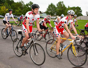 Photo of people riding bikes at the Red Ride Cycling Event