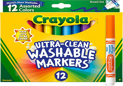 Box of Crayola Ultra-Clean Washable Markers with 12 assorted colors, featuring a broad line tip and "Made with Solar Power" badge. An orange marker is displayed separately on the right side.