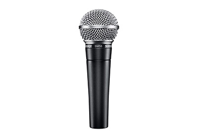 A black and silver handheld microphone with a spherical metal mesh grille, featuring the brand name and model number on the clip near the top. The microphone is shown against a plain white background.