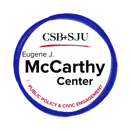 Logo of CSB SJU Institute for Public Policy and Civic Engagement. A blue circle with "CSB SJU" in red at the top and "Public Policy & Civic Engagement" in red at the bottom.