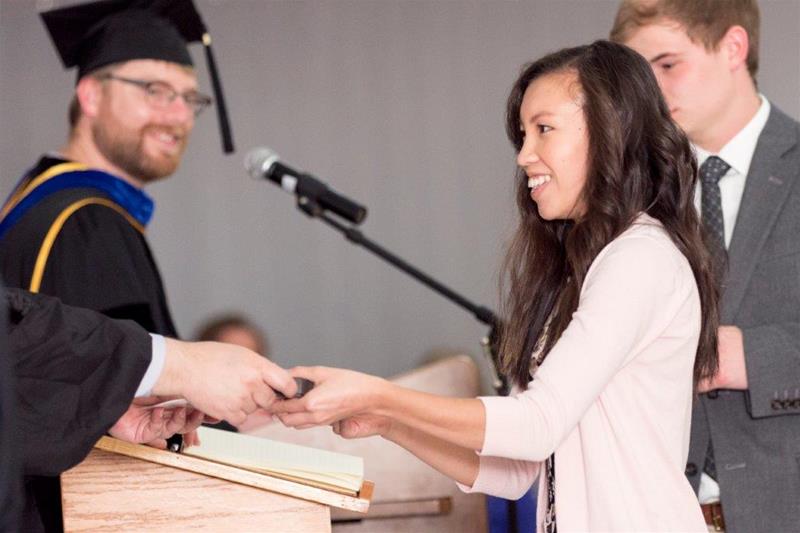 New inductees receive a certificate and PBK key pin at the induction ceremony.