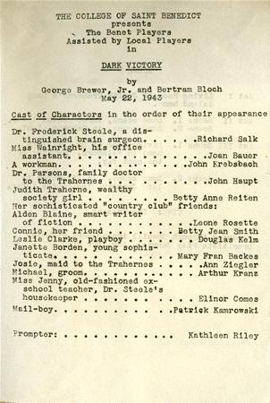 A vintage theater program for "Dark Victory" presented by The College of Saint Benedict's Benet Players on May 22, 1943. It lists characters and actors, including roles like Dr. Frederick Steele and Martha. Directed by Kathleen Riley.