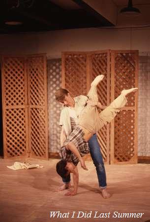 Two actors perform an acrobatic lift on stage, with one person holding the other upside down. The backdrop features wooden lattice panels and the text "What I Did Last Summer" overlays the bottom of the image.