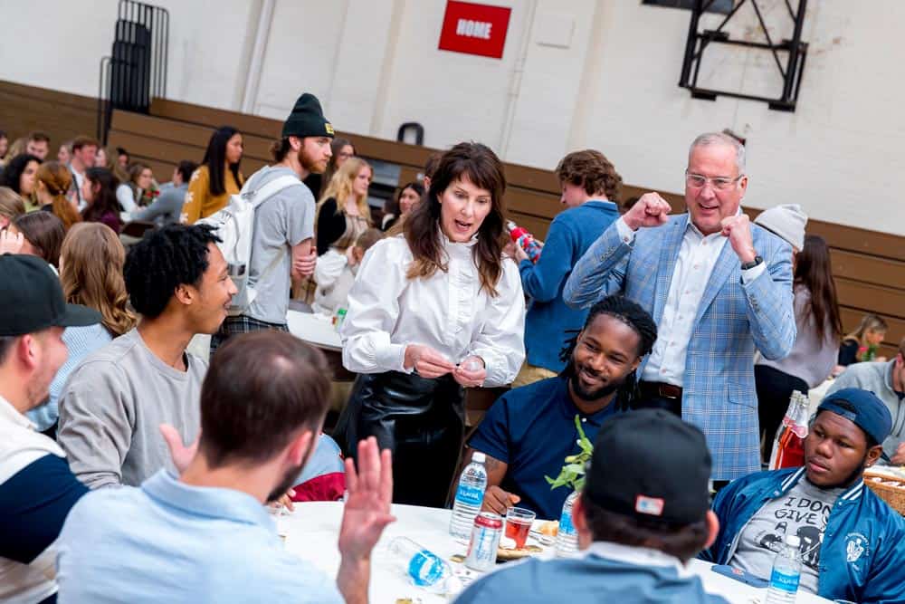 Brian and Carol Bruess with CSB and SJU students