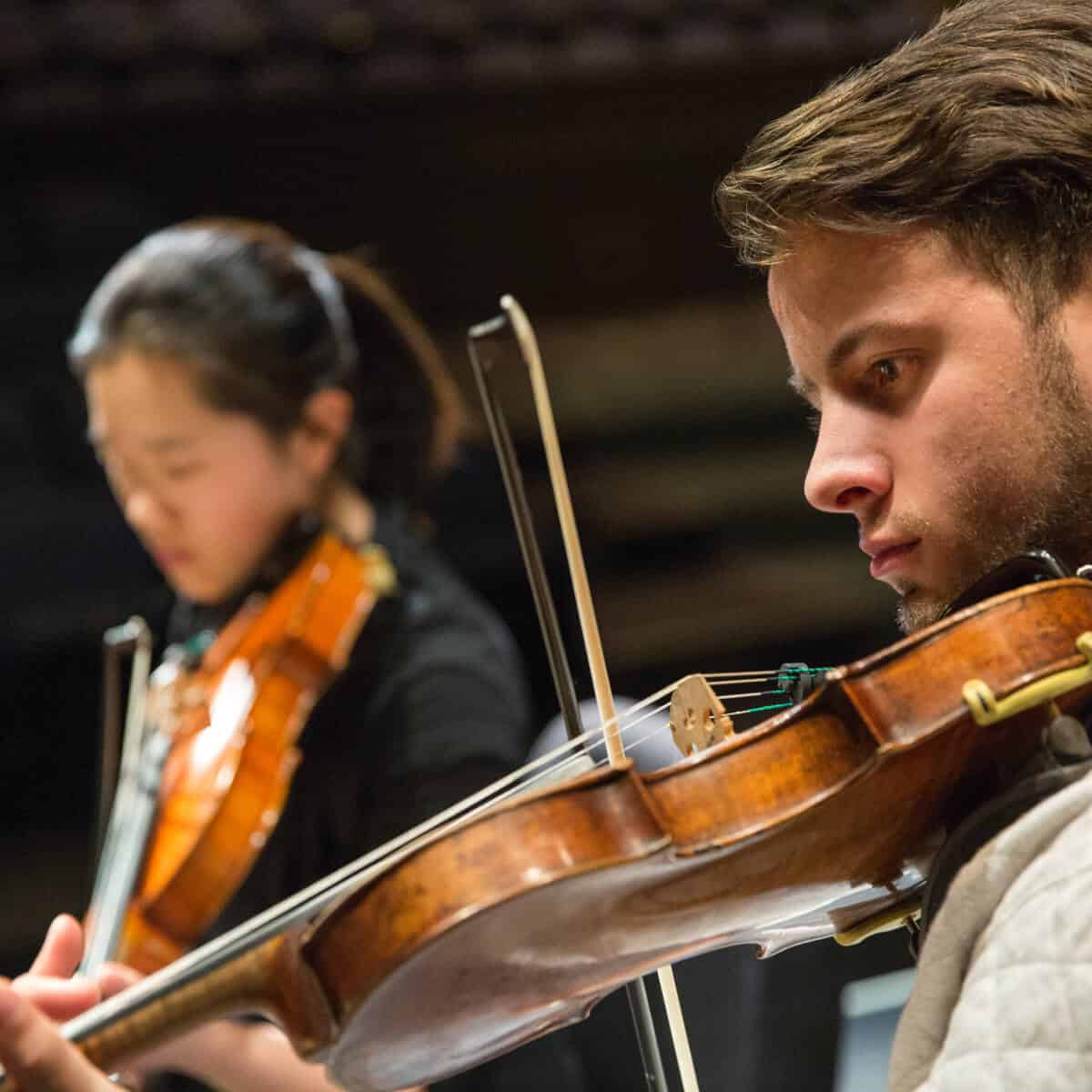 Members of the C S B and S J U music department perform in front of a live audience. 