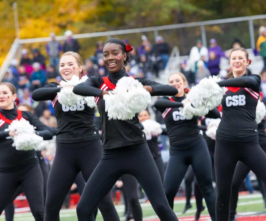 CSB Dance team performing in front of a large audience