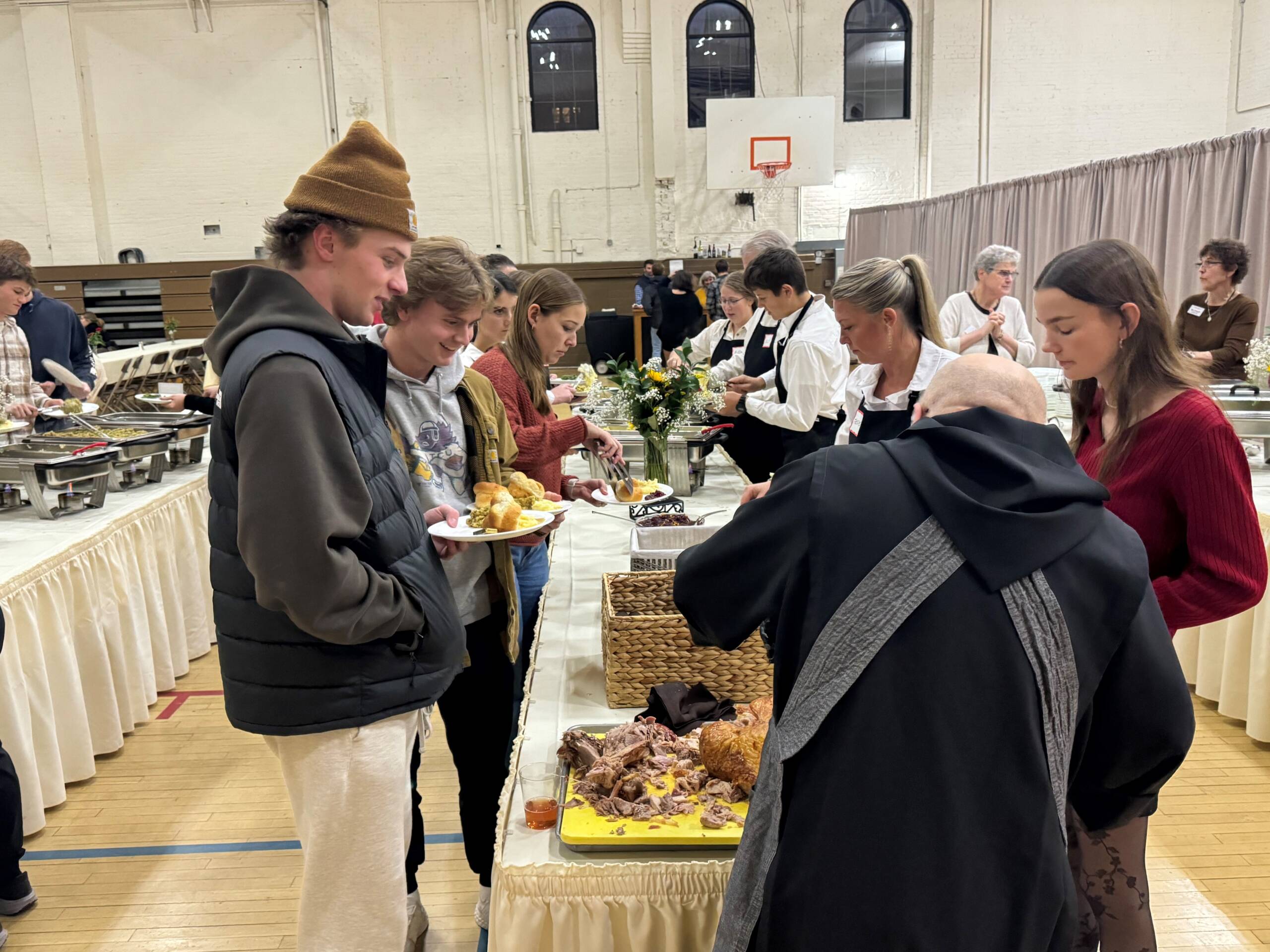 Numbers add up as Thanksgiving dinner tradition at SJU continues