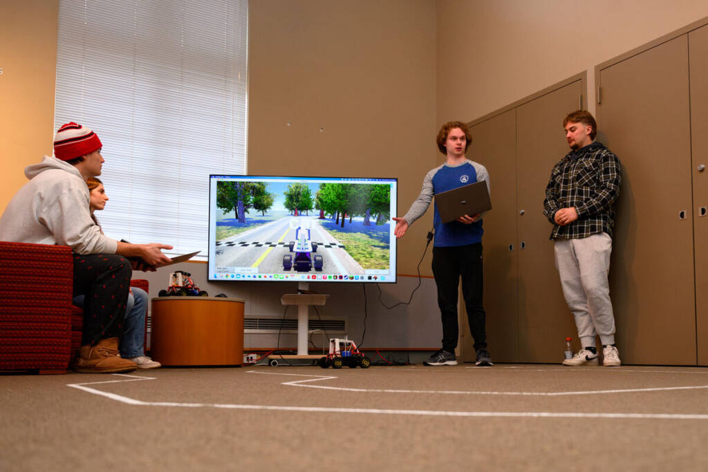 Students in computer science course at CSB and SJU use AI to construct self-driving model cars